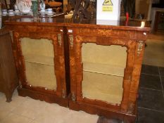A pair of Rosewood marquetry inlaid pier cabinets