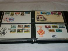 A folder of first day covers