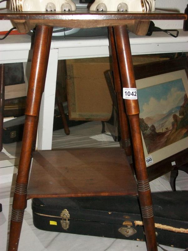 A mahogany occasional table