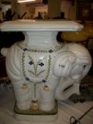 A large pottery elephant plant stand