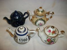 4 miniature teapots