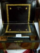 A Mahogany writing box with brass inlay (29.5 x 22 x 14 cm)