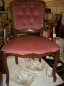 A mahogany salon chair