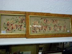 A pair of framed religious text's