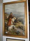 A framed and glazed shepherd with dogs print