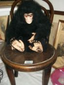 A Dean's gorilla on a child's bentwood chair