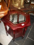 A glass topped side table