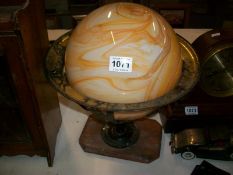 A retro globe table lamp