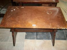 An oak copper topped table