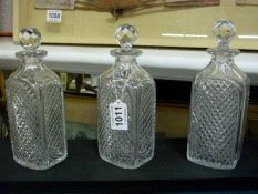 3 cut glass liquor decanters (one stopper a/f)