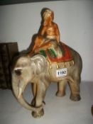 A pottery elephant with rider