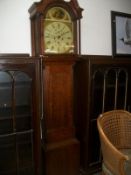 An oak 8 day painted face Grandfather clock by Andrew Peddie, Stirling