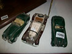 4 Burago model cars
