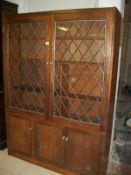 A flame effect mahogany wall unit