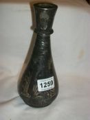 An Indian Bidriware bottle vase with silver inlay (damaged)