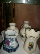 A pair of vases, 2 vases decorated with pansies and a Losel ware jug