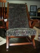 An old upholstered rocking chair