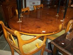 A good extending dining table and 6 chairs