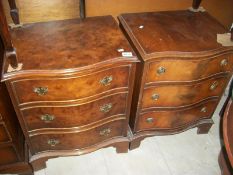 A pair of serpentine front 3 drawer chests