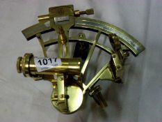 A brass sextant
