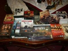 A quantity of boxed war DVD sets and a Fred Dibner boxed set