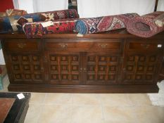 A good quality 4 door oak sideboard