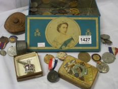 A tin of medals etc