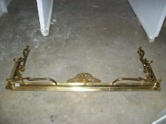 An adjustable brass fender
