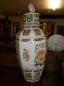 A large floral decorated Oriental style lidded vase