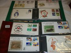 2 folders of first day covers, some signed