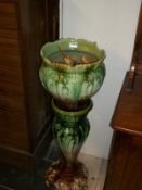 A majolica jardiniere and stand