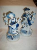 A pair of blue and white figurines