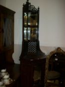 A Victorian Chippendale style corner cabinet