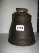 A Huntley and Palmer's bell shaped biscuit tin