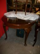 A good mahogany dining table with one leaf