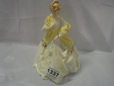 A Royal Doulton figurine, first dance