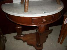 A mahogany marble top washstand