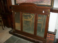 An oak over mantel mirror