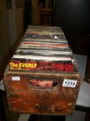 A box of 45rpm records including Everly Brothers and Bo Diddly picture covers