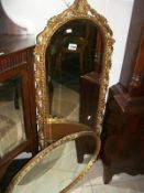 2 gilt framed bevel edged mirrors