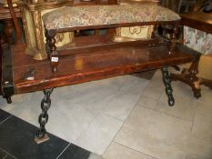 A coffee table with chain legs