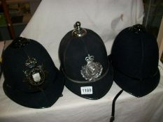 2 City of Lincoln Police helmets (including Parade Helmet) and one other