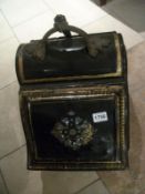 A Victorian metal coal box with shovel