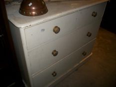 A 2 over 2 painted chest of drawers