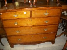 An oak 2 over 3 chest of drawers