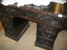 A carved oak desk