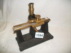 A late 19th century Linear microscope