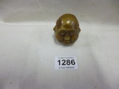 A small brass 4 faced Buddha