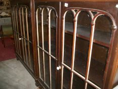 A pair of mahogany glazed cabinets