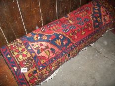 A large red patterned rug